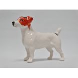 Beswick - A Jack Russell terrier, height 12.5cm, length 15.5cm.