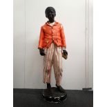 Shop Display Figure - A polychrome plaster life size figure of an African American boy with dark