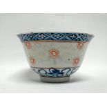 Chinese rice pattern saki cup - A blue and white decorated cup with banner decoration to lower