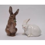 Royal Copenhagen - Two rabbits, No.1019 and No.1691, largest height 9cm.