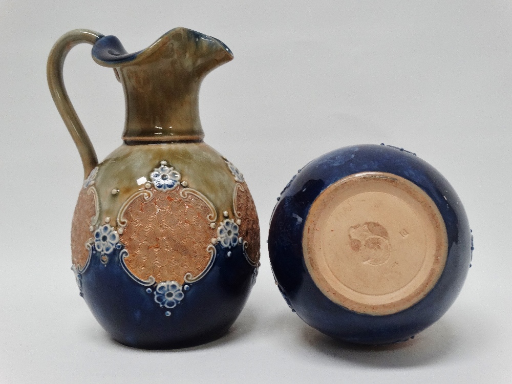 Royal Doulton England - A pair of glazed and bas relief decorated jugs, marked 8294 and maker's mark - Image 2 of 4