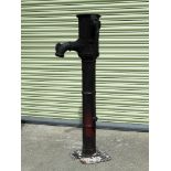 Water pump - A black painted, cast iron water pump, height 130cm.