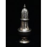 A silver baluster shape pepperette, London 1769, maker's mark for James Jennings, height 13cm,