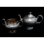 A silver bullet shaped teapot and sucrier, the teapot with Masonic inscription 'Presented by The