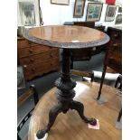 Victorian burr walnut tripod table - A circular topped table with carved and turned column and