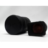 A Leitz Wetzlar Elmarit-R 28mm f2.8 lens in black finish with orange filter, hood and Leitz soft