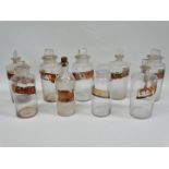 Pharmaceutical apothecary/chemist - A set of nine 19th century chemist's bottles with gilt, red