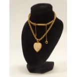 A 15ct gold heart shaped locket set seed pearls, together with a 9ct gold ropetwist chain with