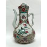 Chinese famille jaune - A tall vase shaped lidded ewer, with pictorial cartouches featuring sparrows