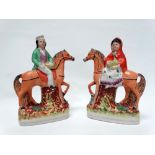 Staffordshire - A pair of figures on horseback, the lady sat side saddle, height 24cm.