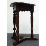 19th century oak shamrock occasional table - A three legged table with carved frieze, shaped