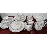 Royal Doulton Burgundy tablewares - Comprising of six tea cups, six saucers, six side plates, two