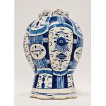 Delft - A melon sided vase with floral decoration, height 25cm.