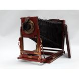 A good Triple Victo half-plate mahogany field camera by Sands Hunter & Co. Ltd, London with Goerz