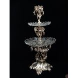A Victorian silver plate table centrepiece - A central glass tazza with grapevine decoration,