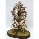 Gothic skeleton clock under dome - A chain fusee timepiece with ornate brass frame and pierced