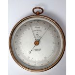 19th century brass cased hanging barometer - A T. Wheeler London cylindrical hanging barometer