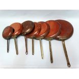 Chef's copper pans - A set of seven graduated cooking copper pans with cast bronze handles,