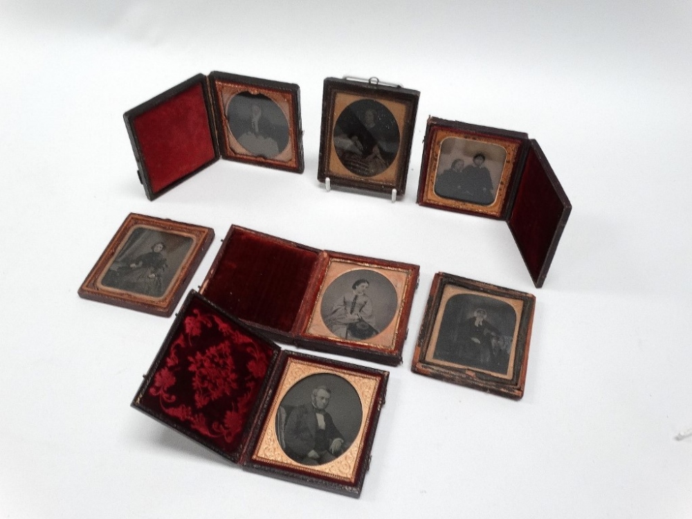 Seven sixth-plate ambrotype portraits, miscellaneous subjects and cases. (7)