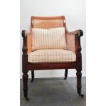 Regency bergere library chair - A mahogany chair with feather squab cushions removing to reveal a