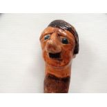 MILITARIA - World War Two (WWII) Folk Art - A carved ash stick with pommel formed as a caricature of