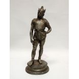 Norse warrior/Viking - A plated figure of a Norse warrior/Viking standing on a circular plinth,