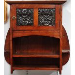 Arts and Crafts - An embossed copper panelled hanging wall cupboard, height 60cm, width 60cm.