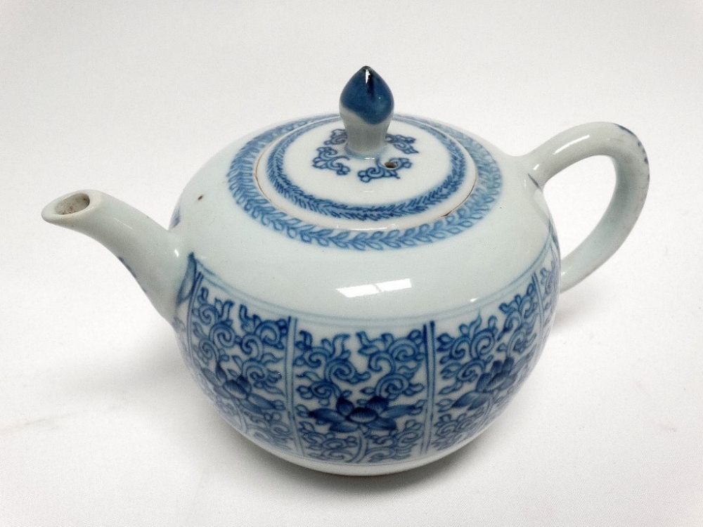 Circa 1900 Chinese lidded teapot - A blue and white peony and scroll decorated teapot, height 11.5. - Image 3 of 4