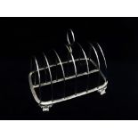 A silver six division toast rack, London 1817, maker's mark for William Abdy II, length 16cm, height
