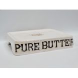 Advertising - Dairy Supply Co. Limited Museum St London, a ceramic 'Pure Butter' stand, marked,