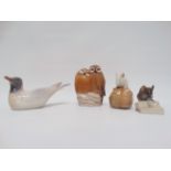 Royal Copenhagen - A group of two owls, No.834, height 8.5cm, together with a nesting gull, No.1468,