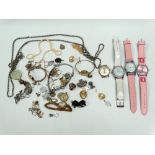 A small quantity of costume jewellery and watches.