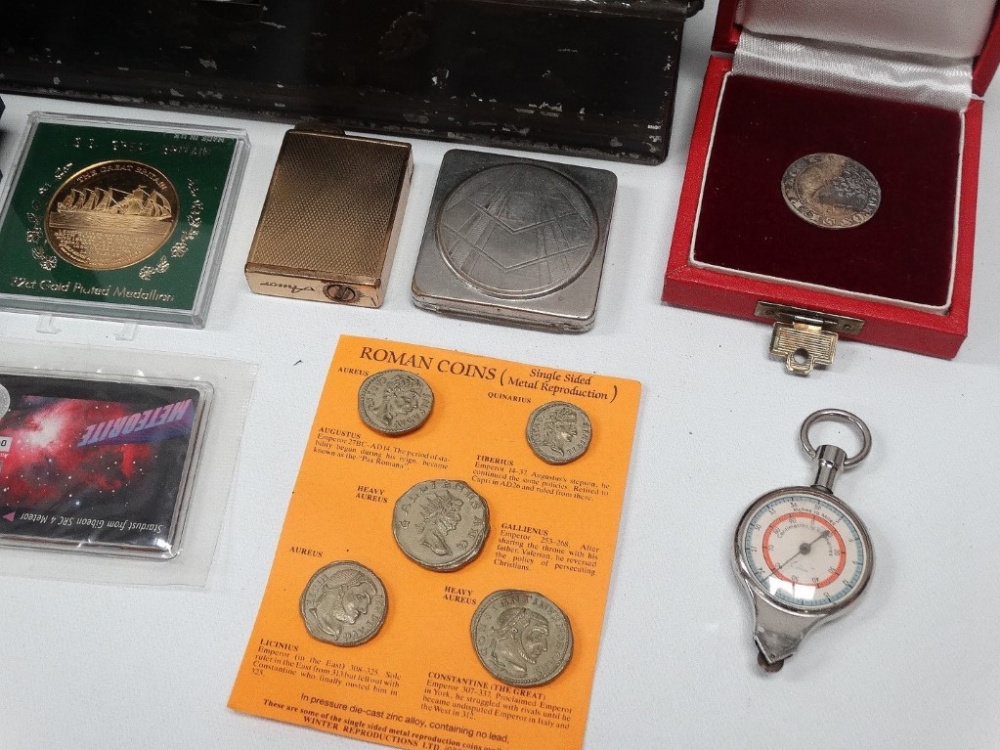 A tin containing tokens, coins, napkin rings, a lighter, penknife and other miscellaneous items. - Image 2 of 3