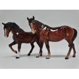 Beswick - Two bay horses, heights 16.8cm and 15cm.