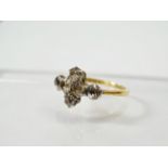 An 18ct gold and platinum set diamond ring set six old cut diamonds, totalling 2.7ct