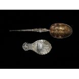 A silver caddy spoon with scallop shell decoration, Birmingham 1963, maker's mark for John Rose,