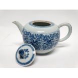 Circa 1900 Chinese lidded teapot - A blue and white peony and scroll decorated teapot, height 11.5.