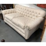 Victorian button back two seater sofa - A recovered feather upholstered scroll arm sofa on square
