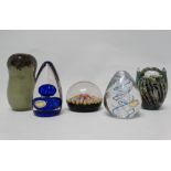 Glass paperweights - Five paperweights, three marked Wedgwood and one marked Mdina and another,