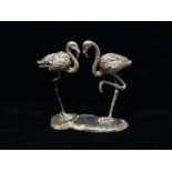 A silver figural group of a pair of flamingos, London 1987, maker's mark BJW, height 8cm, weight