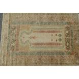 A Turkish Kayseri hand knotted silk prayer rug, circa 1900, 185 x 126.5cm.