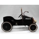 Child's pedal car - A 1930s style open top steerable car, with Police squad car livery, height 54cm,