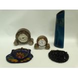 Serpentine etc - Two serpentine clocks of circular form, two ladies bags, one beaded and a Poole