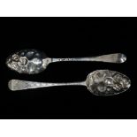 A pair of large silver berry spoons with engraved diamond decoration to the shafts, London 1777,