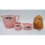 Sylvac - A dog modelled as a money box, height 15cm, together with a two jugs and a bowl with
