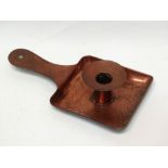 Newlyn Copper - A chamberstick with punchwork decoration to the squared base, stamped NEWLYN, height