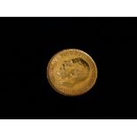 1927 Gold Sovereign Coin - A George V 22ct gold sovereign, diameter 2.17cm, weight 8g.