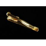 9ct gold - A sprung marked tie clip, weight 4.3g.