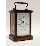 Brass timepiece - Matthew Norman, an 11 jewel, unadjusted, Swiss made carriage clock, signed
