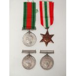 MILITARIA - Four WWII medals, including George VI Italy Star with ribbon, The Defence medal with